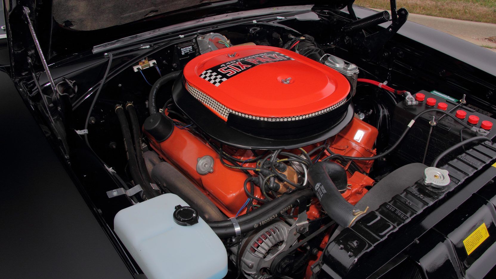 A parked Dodge Charger R/T Six-Pack engine